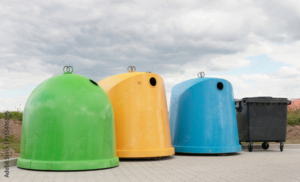 big waste containers: green, yellow, blue and black big waste containers: green, yellow, blue and black