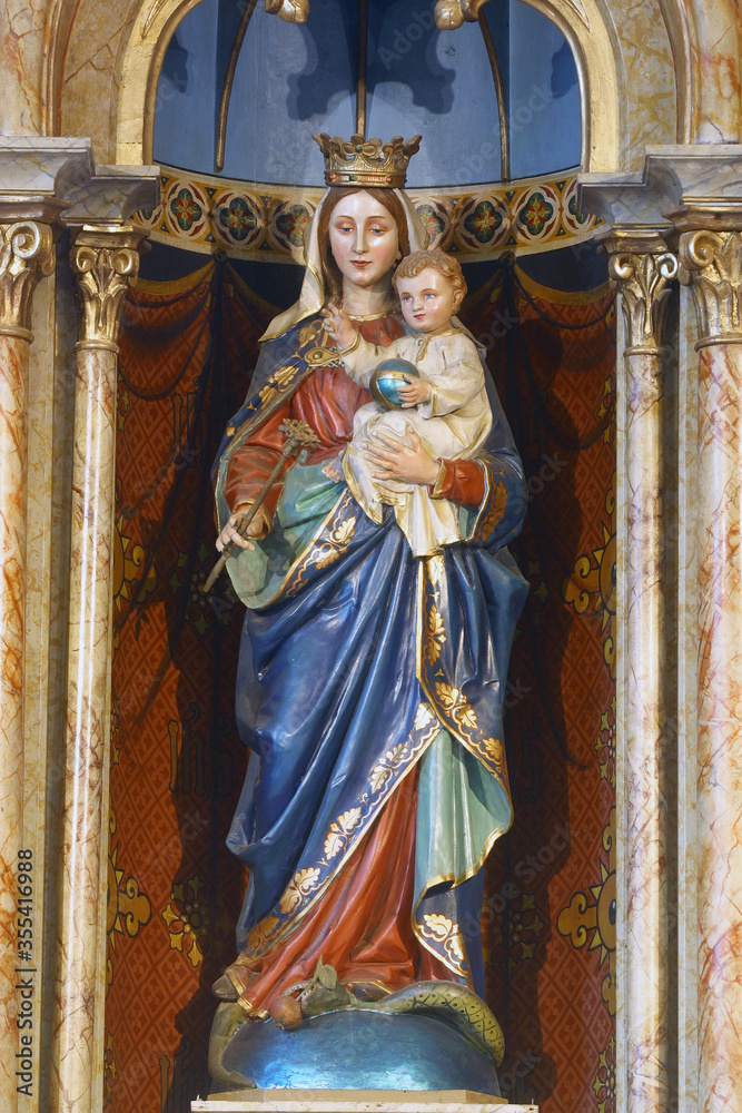 Virgin Mary with baby Jesus, statue on the high altar in the parish church of the Visitation of the Virgin Mary in Garesnica, Croatia