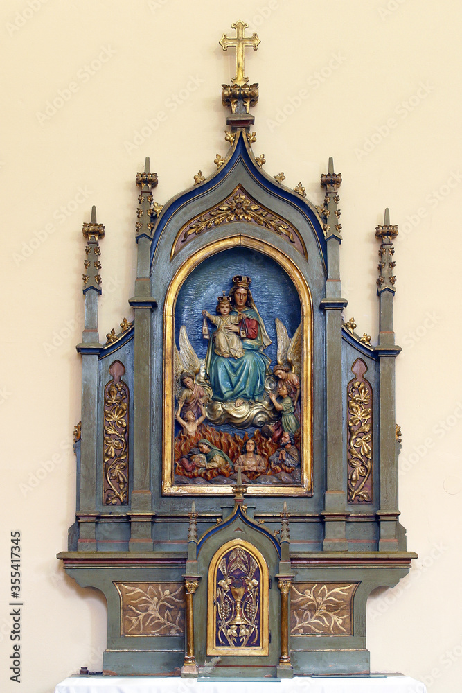 Obraz premium Altar of Our Lady of Mount Carmel in the parish church of St. George and the Immaculate Heart of Mary in Kaniska Iva, Croatia