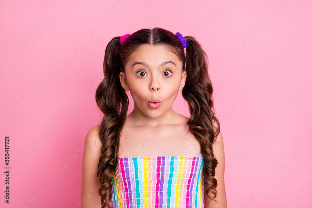 Photo of beautiful little lady two lovely cute curly tails good mood open mouth listen good news wear casual colored rainbow dress summer singlet isolated pastel pink color background Photo of beautiful little lady two lovely cute curly tails good mood open mouth listen good news wear casual colored rainbow dress summer singlet isolated pastel pink color background