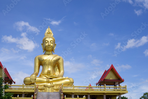 Big golden Buddha  background is blue sky