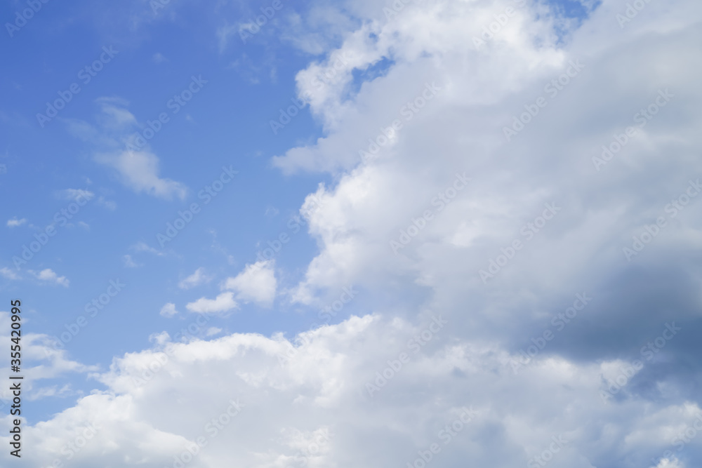 Beautiful bright blue sky and white fluffy clouds Beautiful bright blue sky and white fluffy clouds