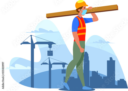 A construction man is carrying a material for building construction