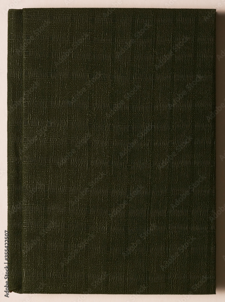 Fototapeta premium Book cover isolated on the white background. Leather covered book. Blank cover book. Faded cover of a vintage book.