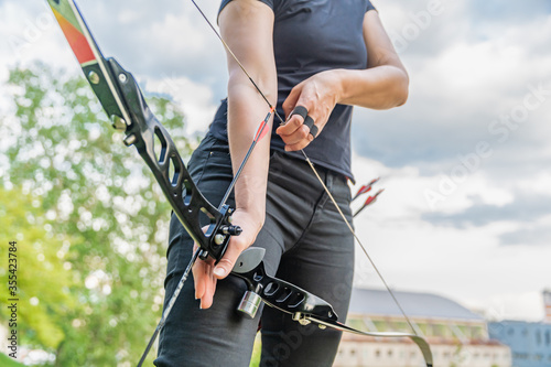 Bild auf Leinwand Deploy the arrow to shoot from the archery bow