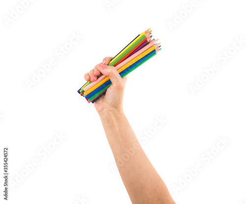 Pencils in hand isolated on white background