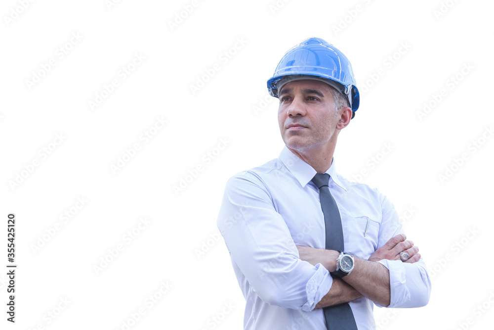middle aged engineer wearing blue helmet, standing cross-legged isolated on white background with clipping path. middle aged engineer wearing blue helmet, standing cross-legged isolated on white background with clipping path.