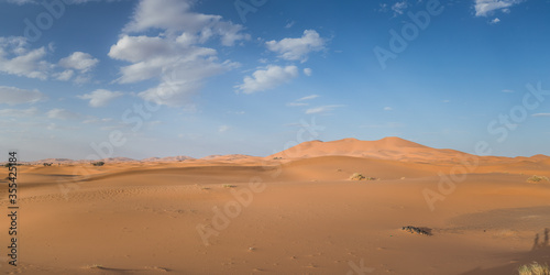 Sand dessert landscape with clouds and sky