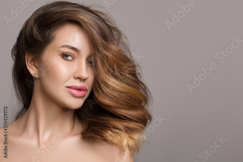 Young beautiful woman. thick luxurious hair. hairstyle. Copycpase