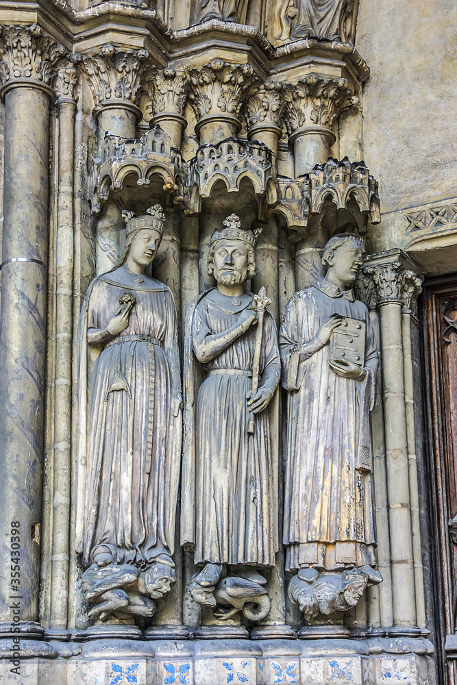 Saint-Germain-l'Auxerrois Church situated in Paris, France. Founded in 7 century, church rebuilt many times over several centuries. Sculptures at the entrance to the church.