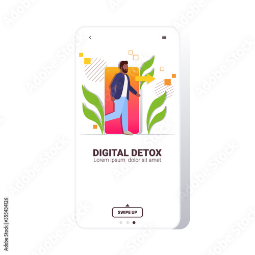 man coming out of cellphone digital detox concept guy escaping from digital addiction abandoning internet and social networks smartphone screen mobile app full length vector illustration