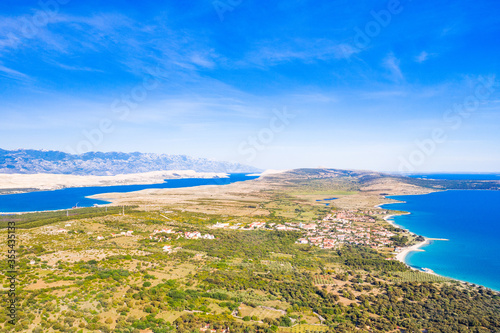 Croatia, beautiful Dalmatian coast, green side of the island of Pag, agriculture fields and Adriatic sea coastline