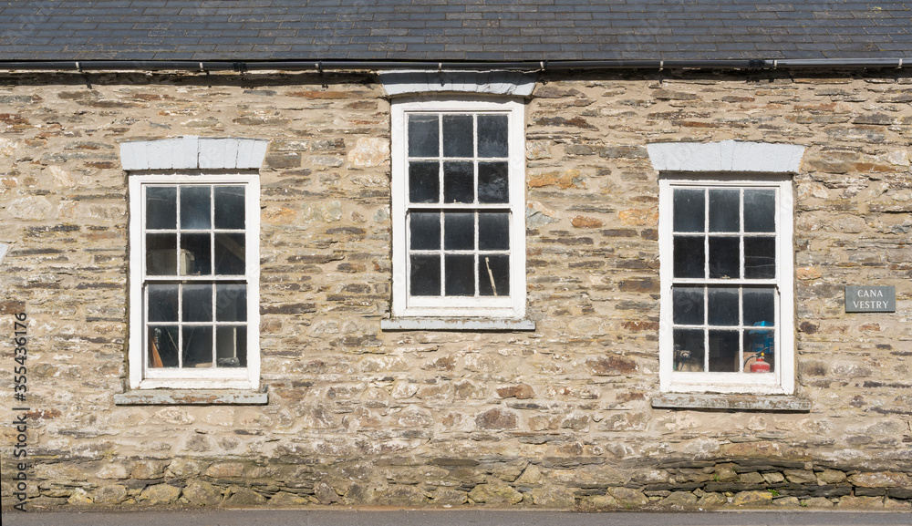 Building with three sash Georgian style windows in Felindre Farchog, near Newport. Pembrokeshire, Wales. UK Building with three sash Georgian style windows in Felindre Farchog, near Newport. Pembrokeshire, Wales. UK