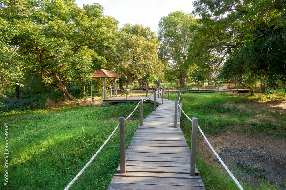 Wooden pathway at the Killing Fields in Phnom Penh, Cambodia