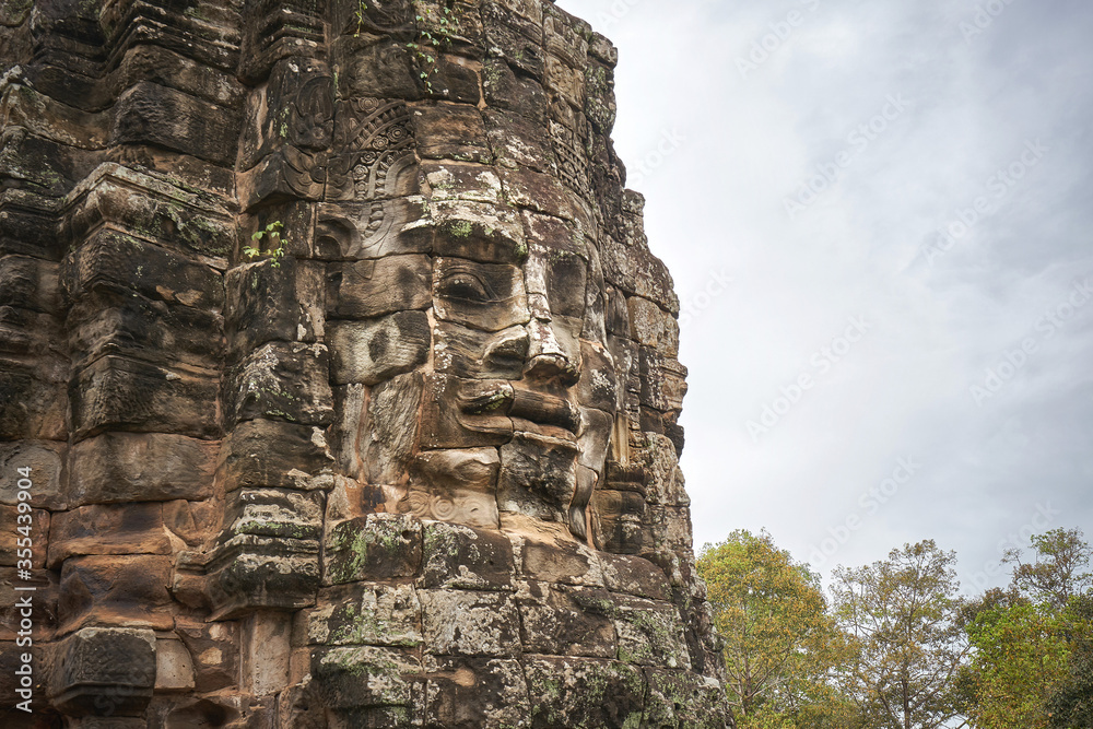 Stone face of Bayon temple at Angkor Thom