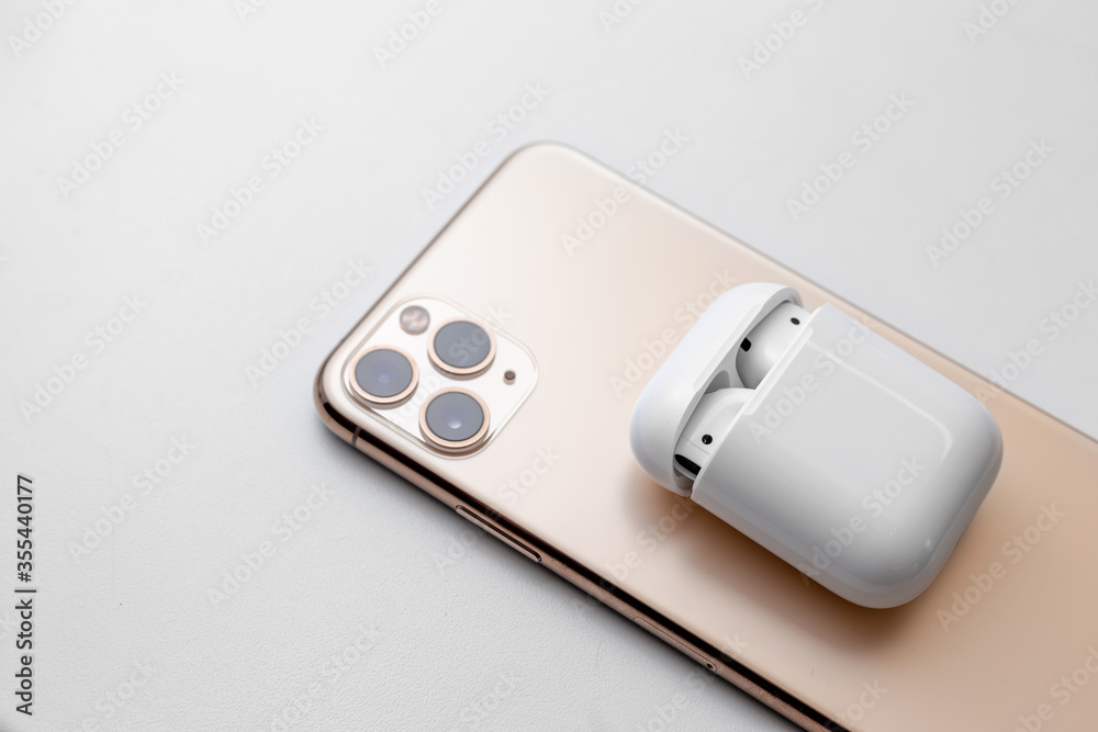 white wireless headphones on a background white wireless headphones on a background