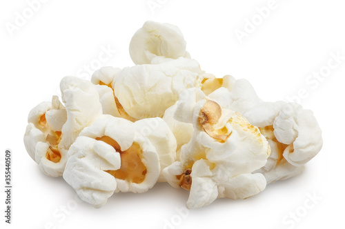 Close-up of delicious popcorn heap, isolated on white background
