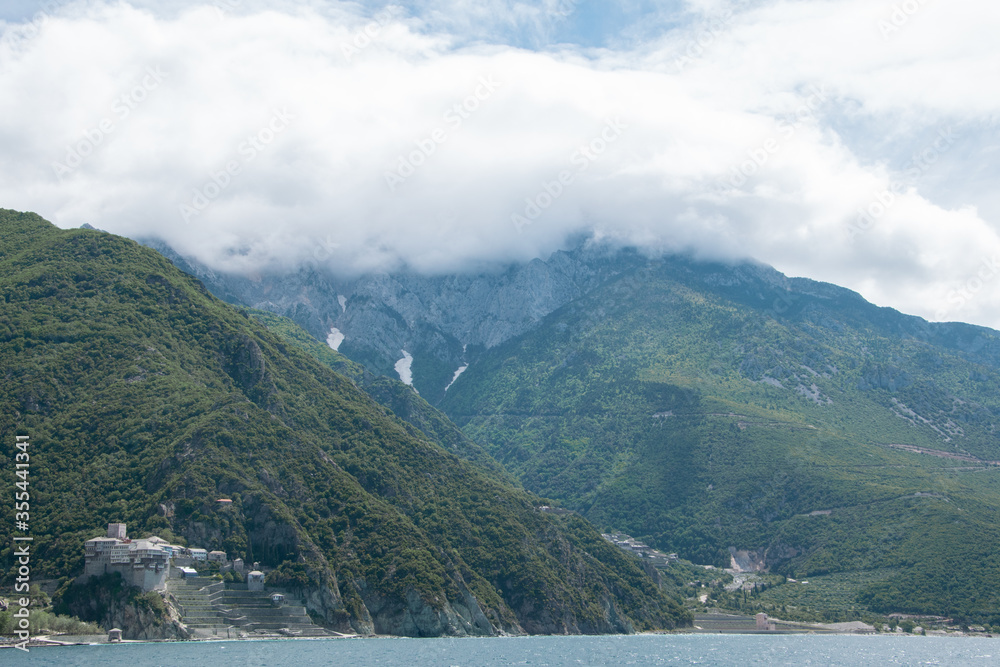 Mount athos monasteries as seen from a boat