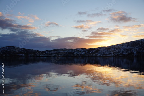 Norwegian fjord during sunset.