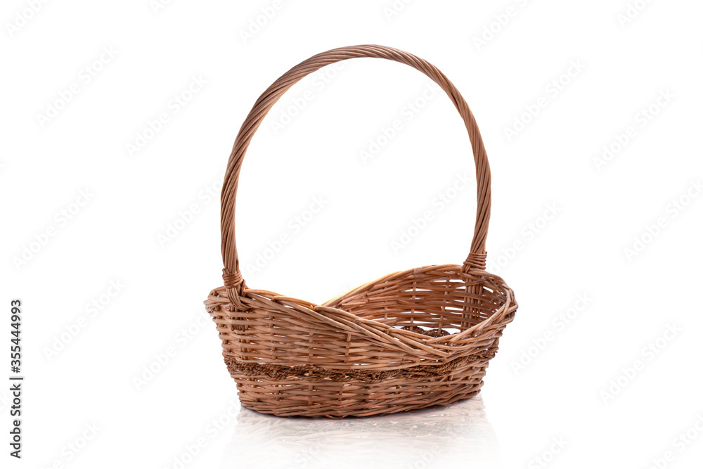 Empty wicker basket isolated with copy space isolated on white background