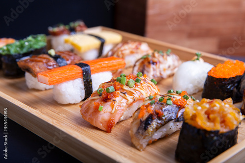 Japanese sushi set , Sushi nigiri rolls and sashimi served in japanese food restaurant menu
