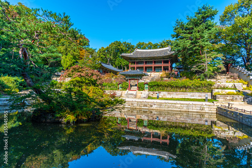 Traditional building at Buyongji Pond inside secret garden of Changdeokgung palace in Seoul, Republic of Korea photo