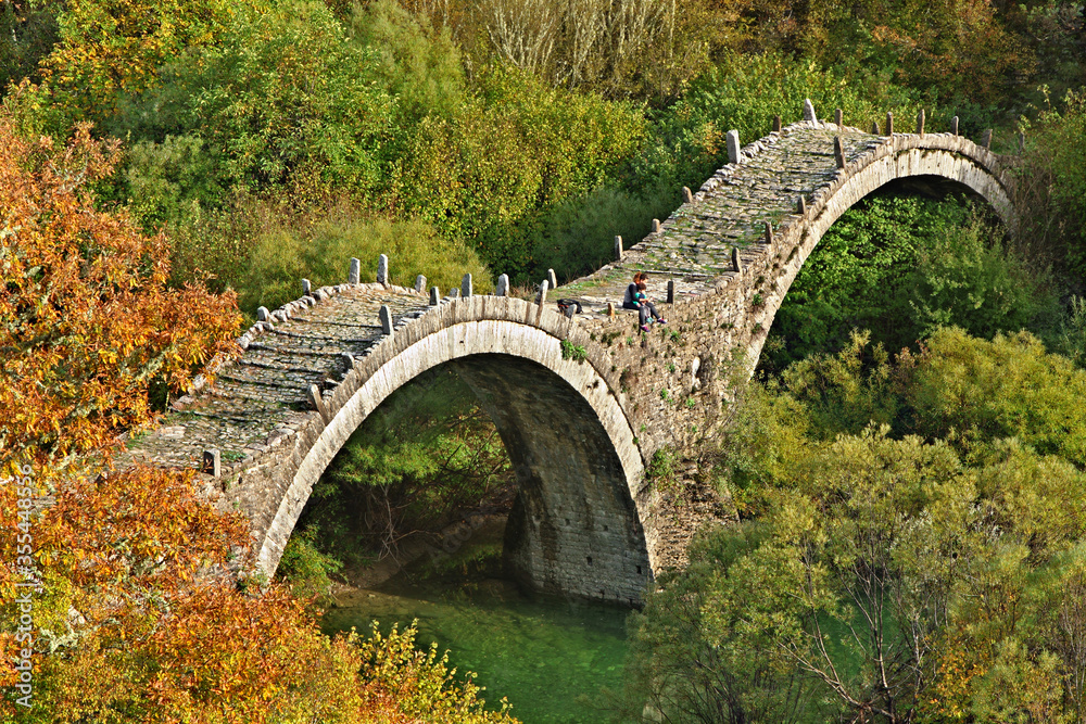 A stone bridge called Kalogeriko, or A stone bridge called Kalogeriko, or