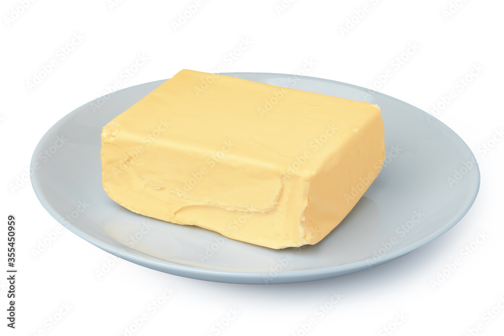 Butter on white plate isolated on white background