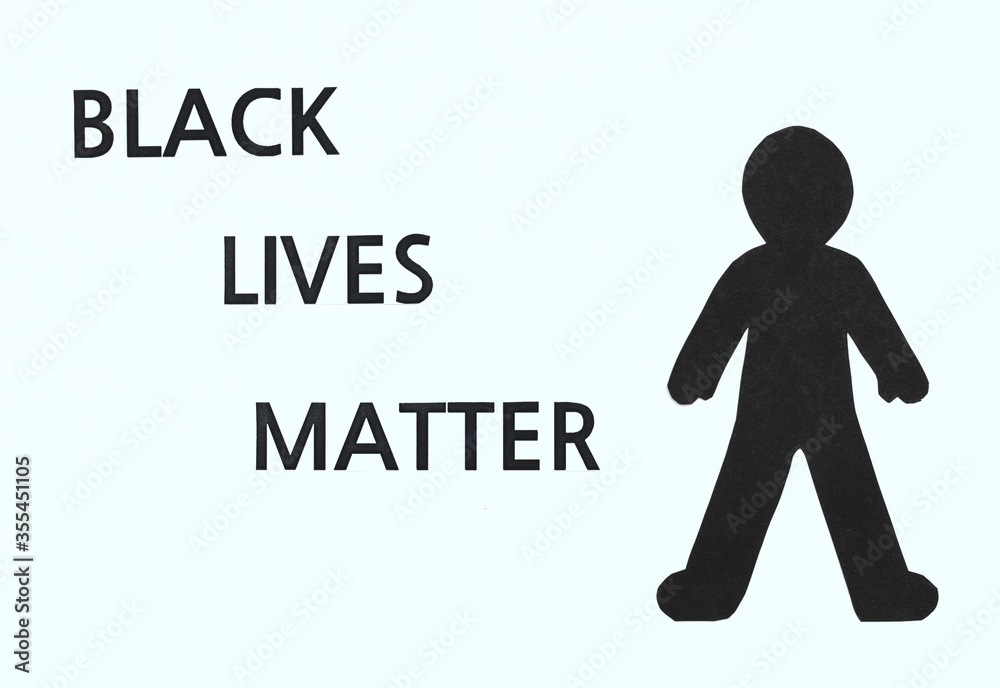 Black Lives Matter flat lay with black paper silhouette on a white background. Stop police brutality, racism and discrimination concepts. Black Lives Matter flat lay with black paper silhouette on a white background. Stop police brutality, racism and discrimination concepts.
