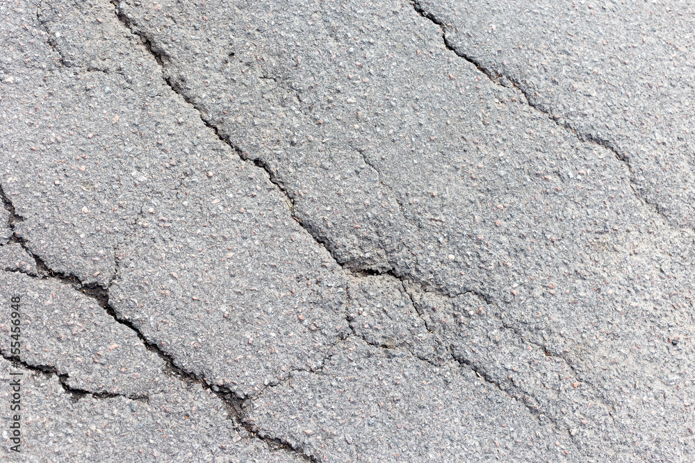 Obraz premium texture asphalt with multiple cracks