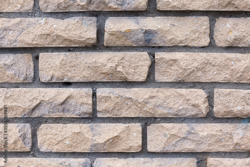 Brick wall brown color with dark inter layers Brick wall brown color with dark inter layers