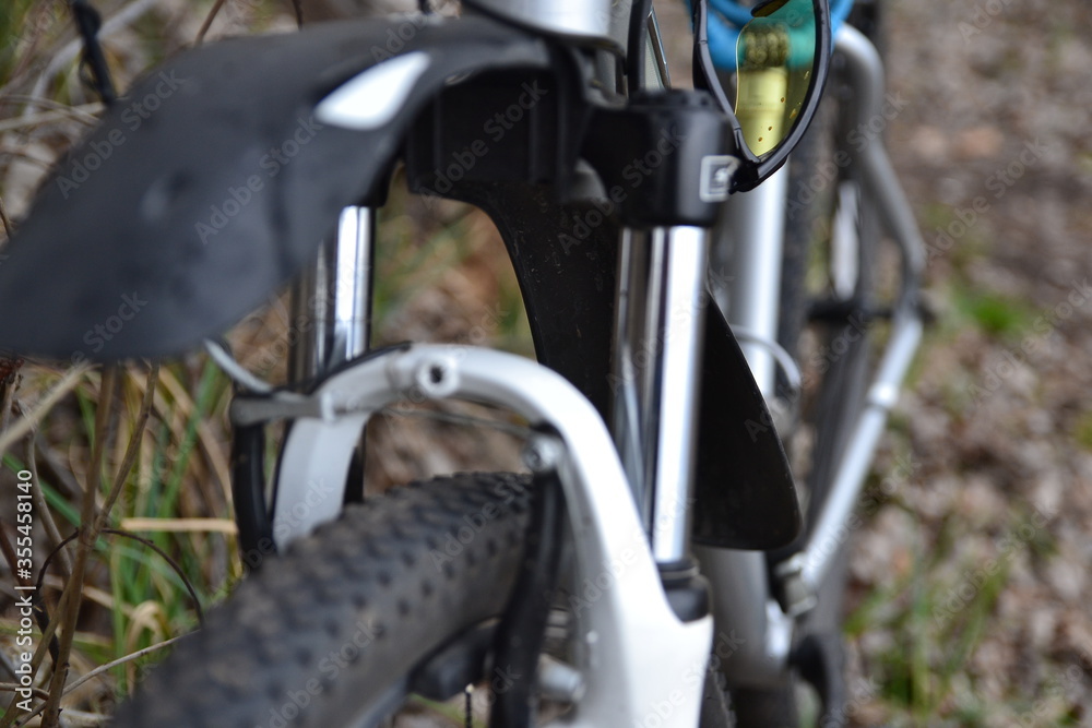 Shallow focus photography of bicycle tire. Bicycle fork. Shallow focus photography of bicycle tire. Bicycle fork.