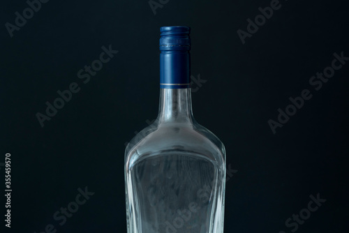 simple glass bottle for alcohol mockup, isolated