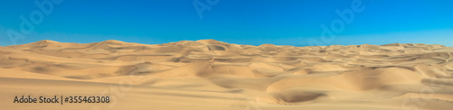 Big sand dunes panorama. Desert and coastal beach sand landscape scenery. Abstract background. © Drepicter