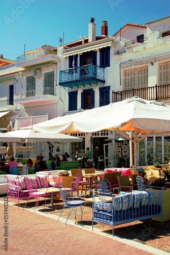 Greece, Skiathos island, street with modern coffee-bar restaurants in Skiathos town, May 6 2012.