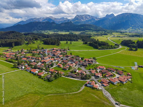 Small village of Eisenberg in Bavaria Germany - the German Alps © 4kclips