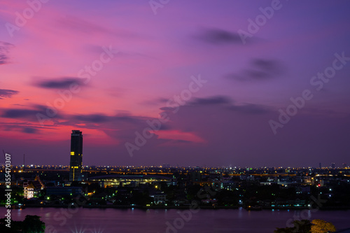 Landscape and Cityscape Building along the Chao Phraya River at night. The Capital landmark of Bangkok Thailand.