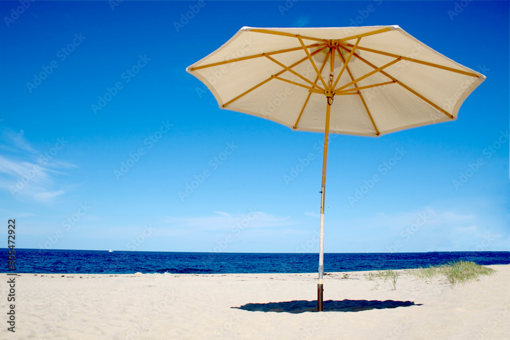 Beach Umbrella on Empty White Sands