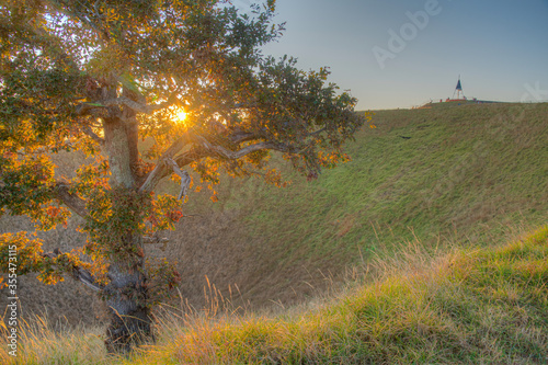 Sunrise view of Mount Eden in Auckland, New Zealand photo