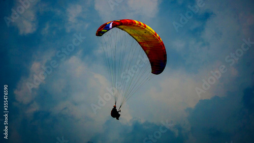 Wallpaper Mural Paragliding flying in the blue sky. Torontodigital.ca