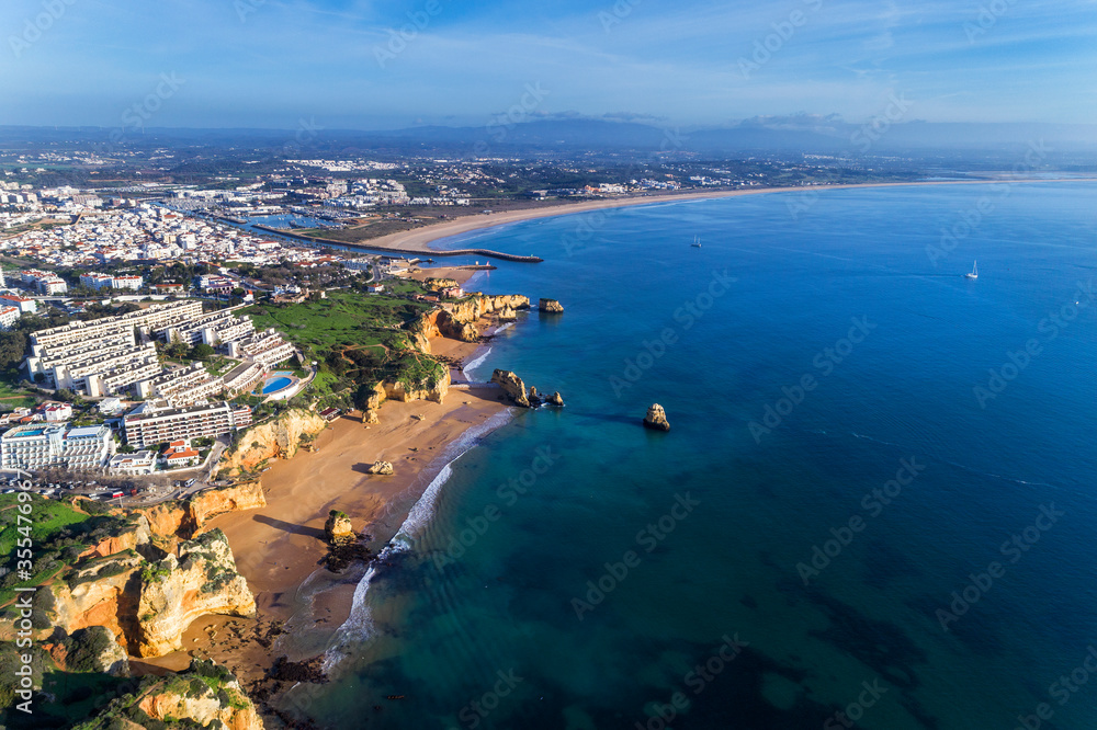 Aerial view of the beautiful city of Lagos from the D. Ana beach (Praia de D. Ana), in Algarve, Portugal