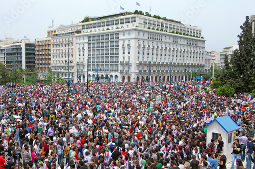 Fototapeta Naklejka Na Ścianę i Meble -  Croud of people demonstrate against government austerity measures, outside the Greek Parliament in Athens