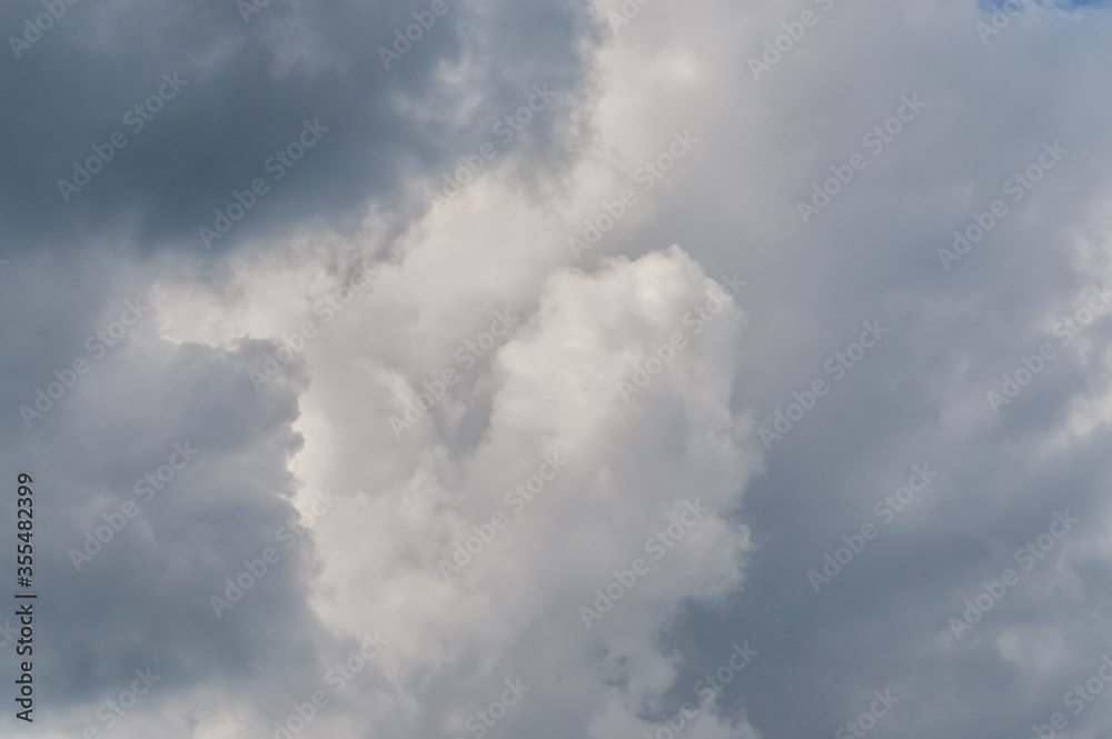 sunlight through very dark clouds background sunlight through very dark clouds background