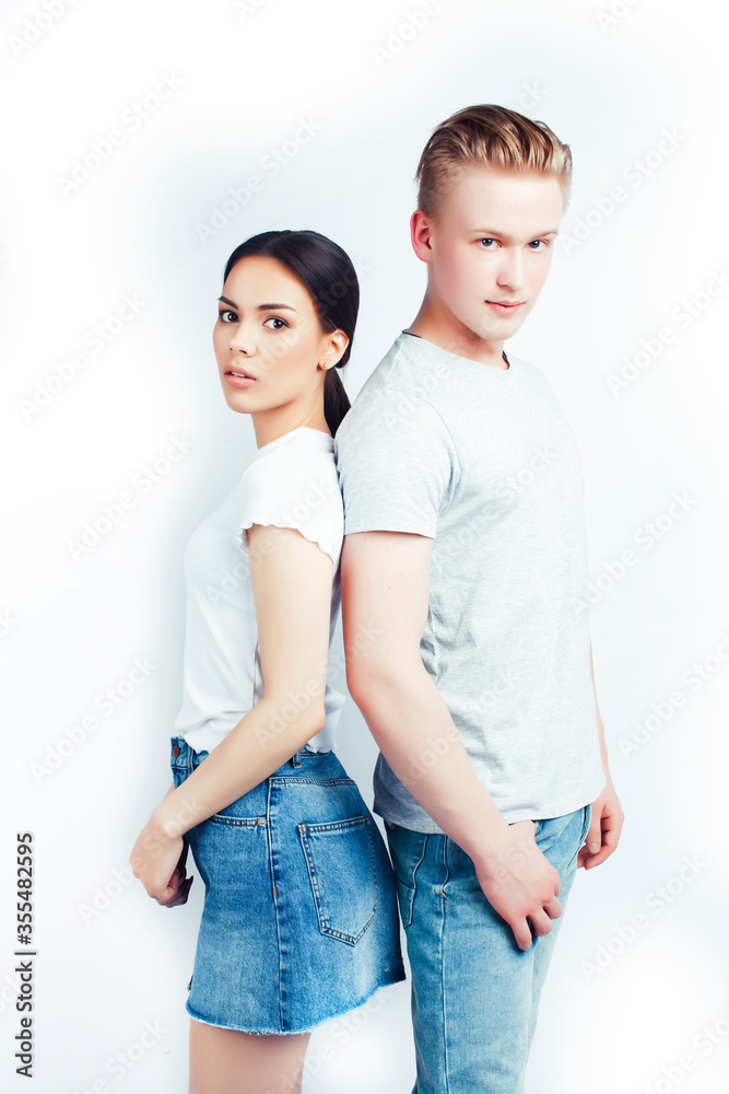 modern hipster guys together couple diverse nations, asian girl and caucasian blond boy isolated on white background, lifestyle people concept modern hipster guys together couple diverse nations, asian girl and caucasian blond boy isolated on white background, lifestyle people concept
