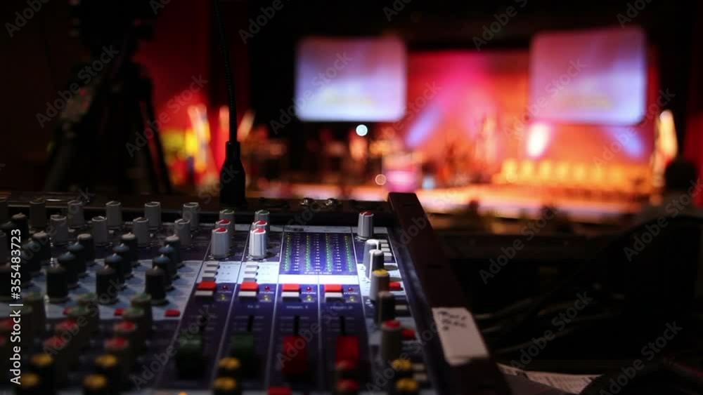 Audio mixer or mixing desk console at a live event or concert stage. Stock Video Clip Footage