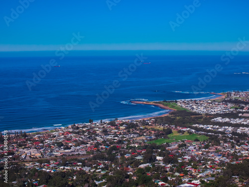 Fototapeta Naklejka Na Ścianę i Meble -  Panoramic view of Wollongong Sydney Australia from Bulli Lookout on a sunny winters day blue skies 