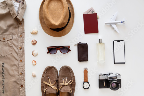 Schilderij op canvas Male summer flat lay traveler accessories set isolated on white