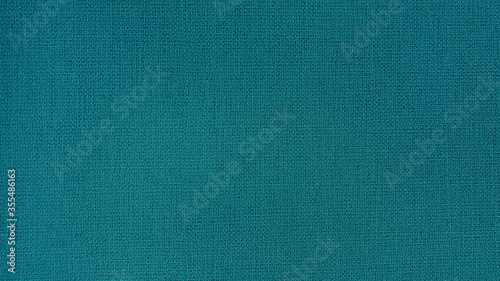 flat plain green turquoise linen fabric texture. abstract fabric background.