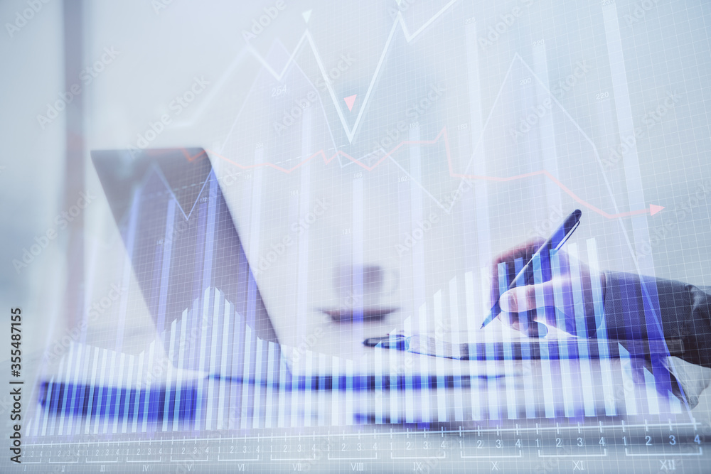 Multi exposure of forex chart with man working on computer on background. Concept of market analysis. Multi exposure of forex chart with man working on computer on background. Concept of market analysis.