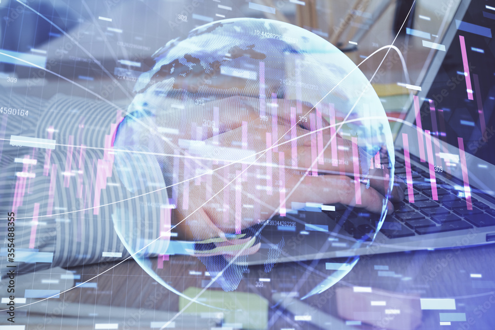 Multi exposure of stock market graph with man working on laptop on background. Concept of financial analysis. Multi exposure of stock market graph with man working on laptop on background. Concept of financial analysis.